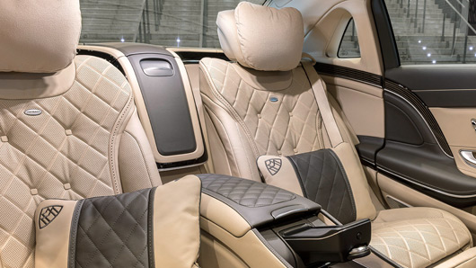 Limousines The beige and dark brown interior of a Mercedes-Maybach represents the pinnacle of automotive opulence, characterized by a sophisticated two-tone color scheme often officially called "Mahogany Brown and Macchiato Beige".