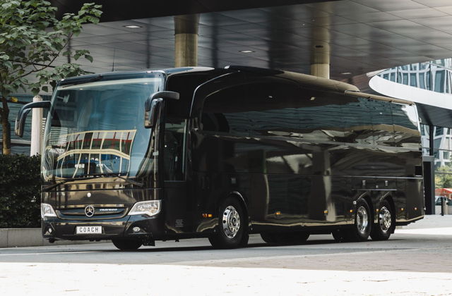 Fleet A huge black luxury Mercedes bus.