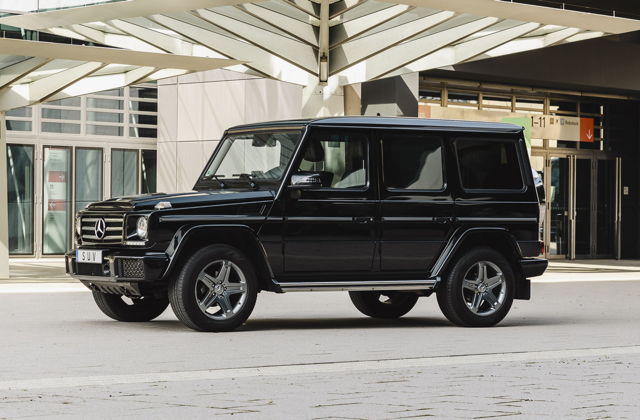 Fleet A black luxury Mercedes G class SUV.